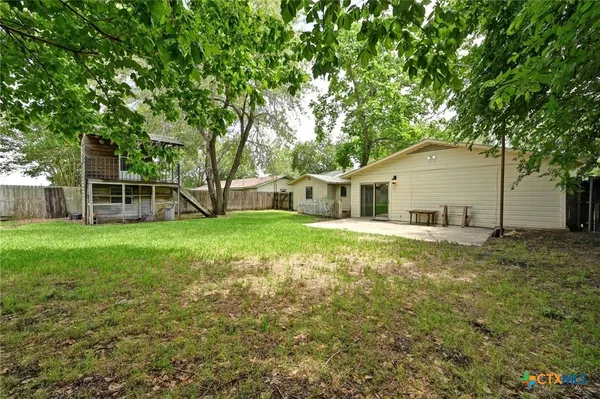 a house view with a garden space