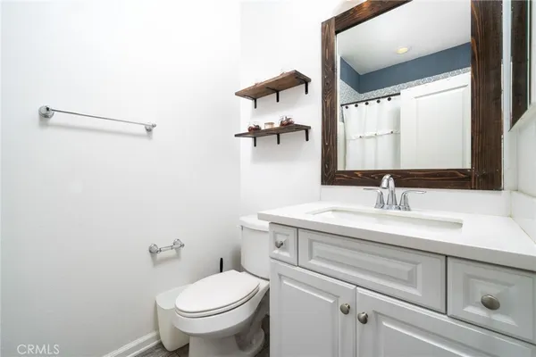a white bath tub with a shower curtain