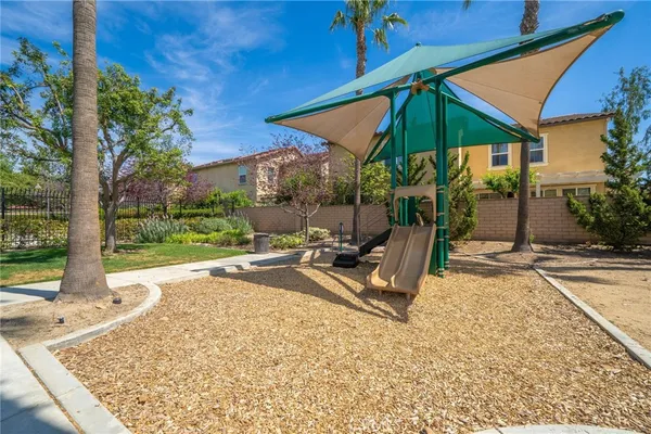 a view of a swimming pool with a lounge chair