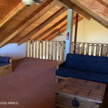 a view of wooden floor in an empty room
