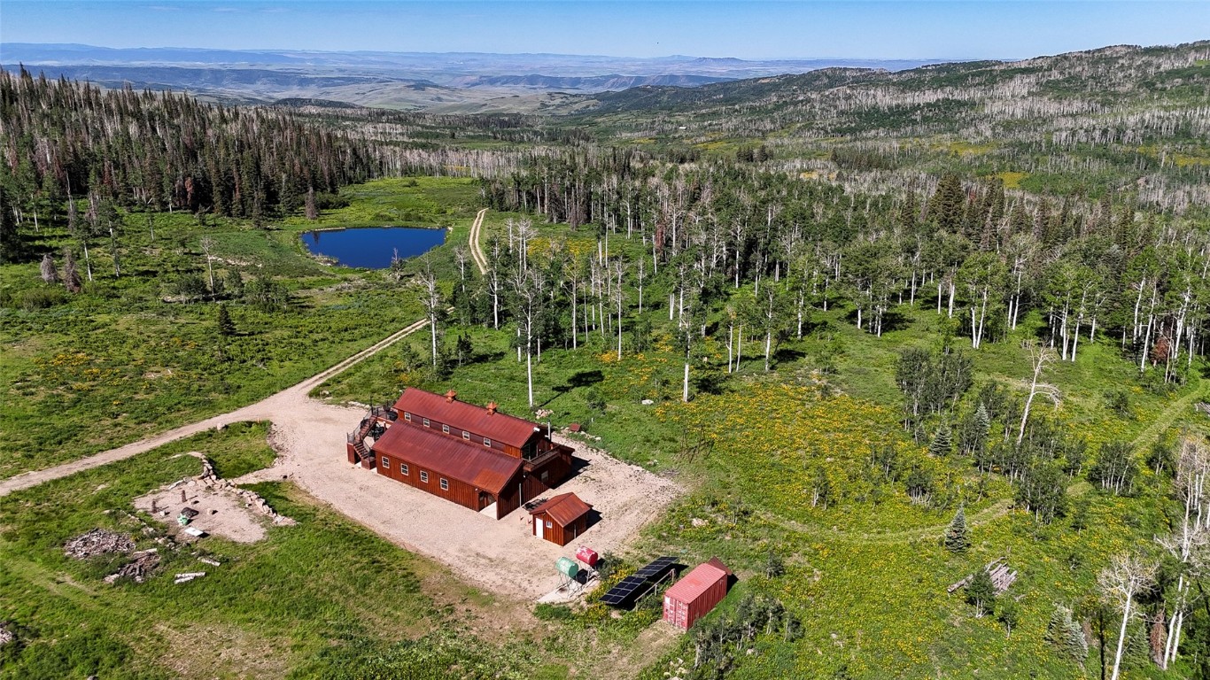 51735 County Road 80 Hayden, CO 81639 - Photo 15 of 46 a view of a yard with an outdoor seating and mountain view