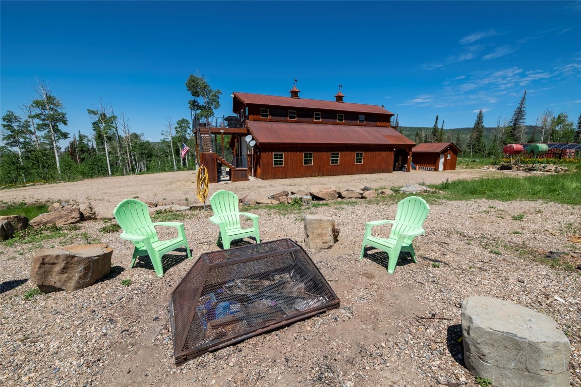 51735 County Road 80 Hayden, CO 81639 - Photo 21 of 46 a view of a chairs and table in the backyard