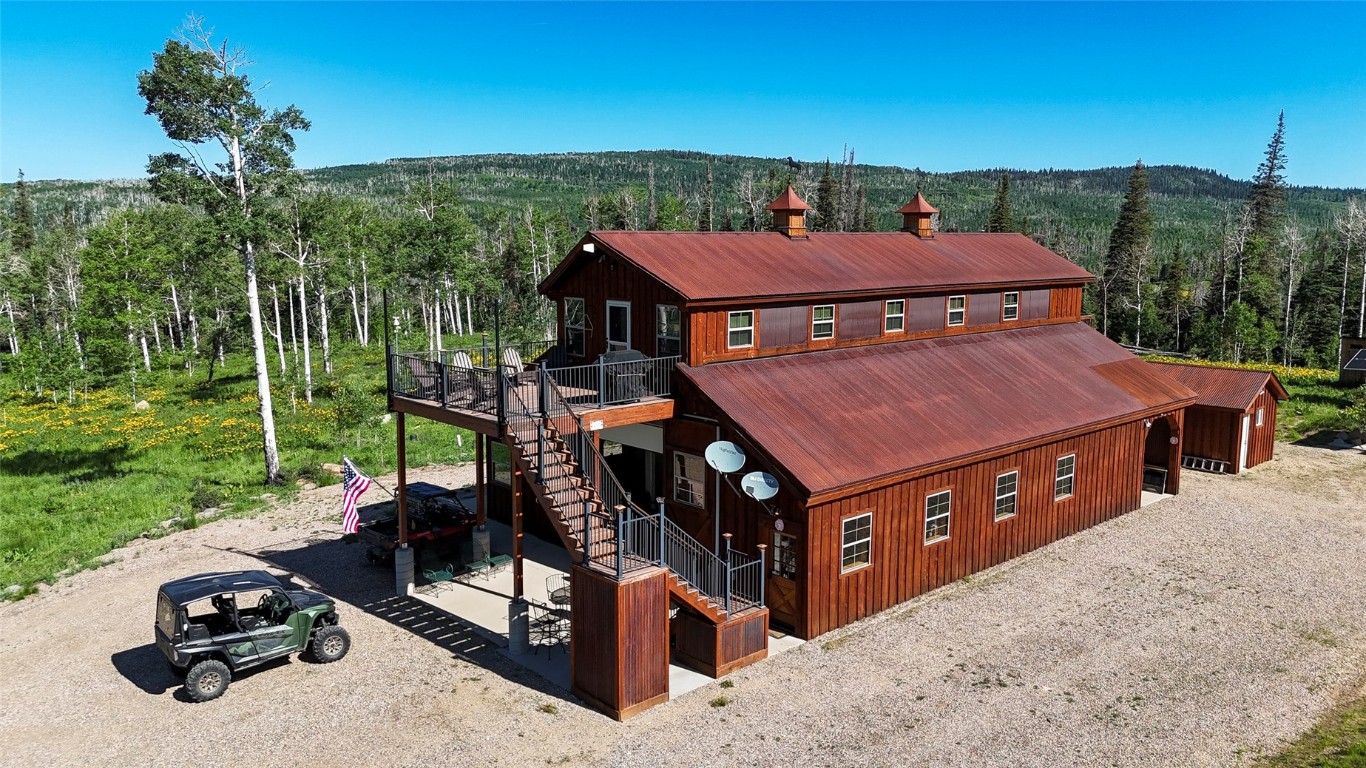 51735 County Road 80 Hayden, CO 81639 - Photo 29 of 46 a aerial view of a house with swimming pool and a yard