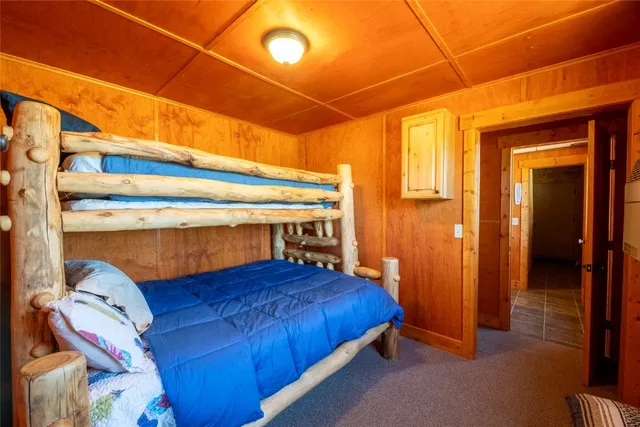 a bedroom with a bed and a shower