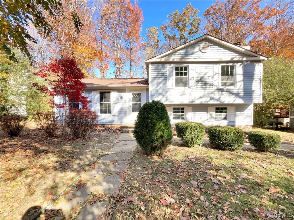 1125 Oldbury Road Midlothian, VA 23113 - Photo 1 of 17 a front view of a house with a yard