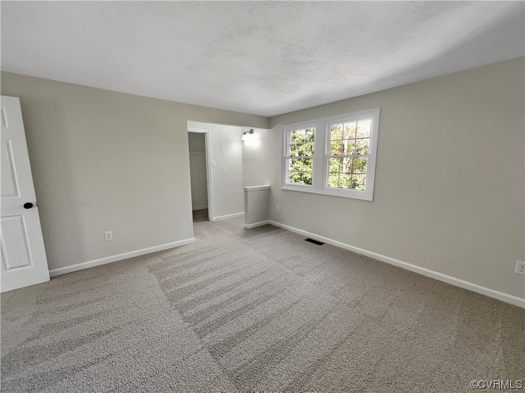 1125 Oldbury Road Midlothian, VA 23113 - Photo 11 of 17 an empty room with windows