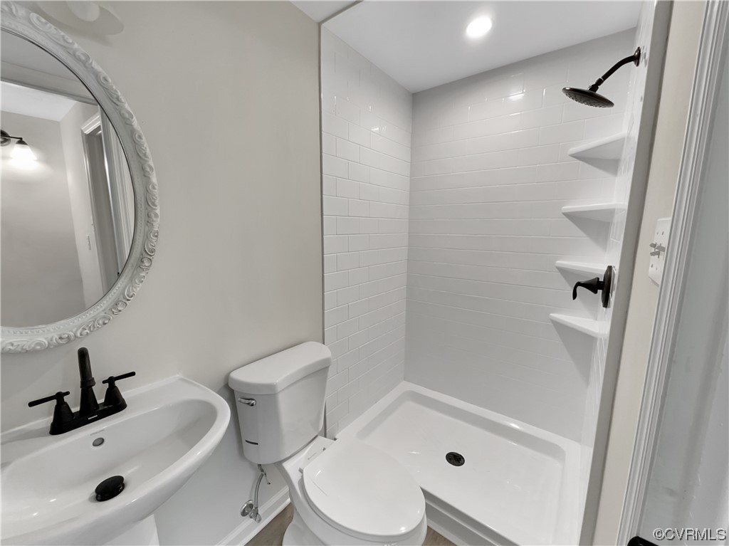 1125 Oldbury Road Midlothian, VA 23113 - Photo 12 of 17 a bathroom with a sink a toilet and shower