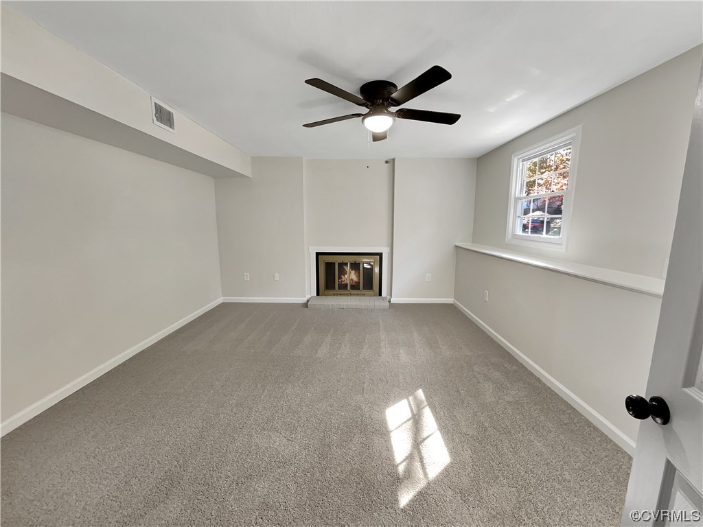 1125 Oldbury Road Midlothian, VA 23113 - Photo 13 of 17 a view of a livingroom with a ceiling fan