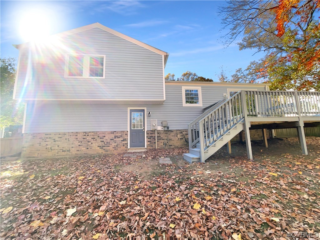 1125 Oldbury Road Midlothian, VA 23113 - Photo 14 of 17 a view of a house with backyard and a tree