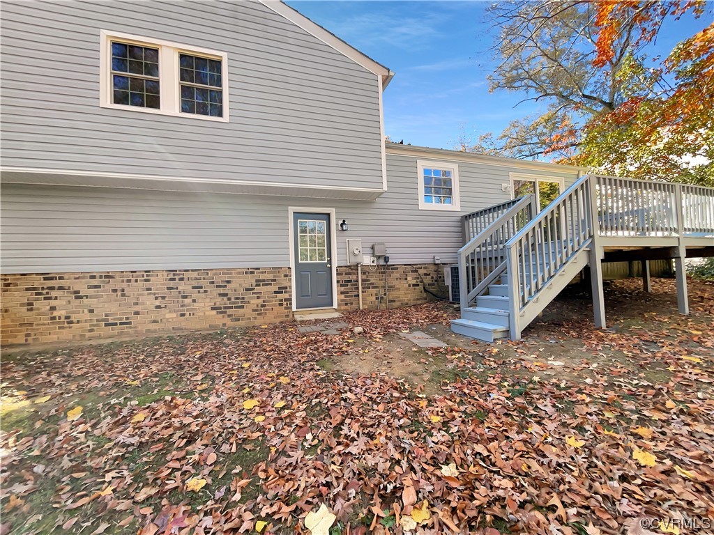 1125 Oldbury Road Midlothian, VA 23113 - Photo 16 of 17 a view of house with deck and outdoor space