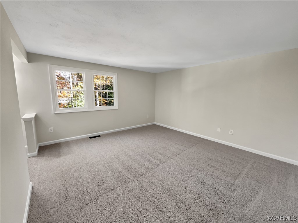 1125 Oldbury Road Midlothian, VA 23113 - Photo 5 of 17 an empty room with a window