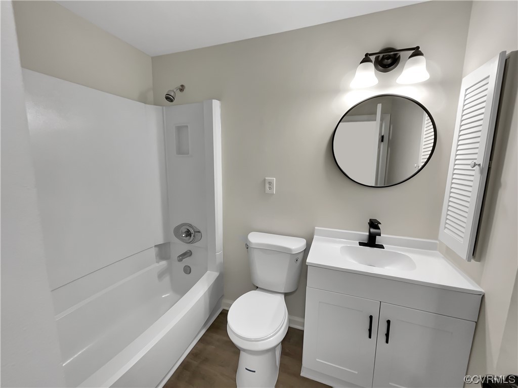 1125 Oldbury Road Midlothian, VA 23113 - Photo 8 of 17 a bathroom with a sink a toilet and a mirror