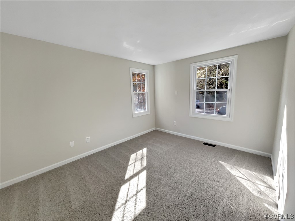 1125 Oldbury Road Midlothian, VA 23113 - Photo 10 of 17 an empty room with a window