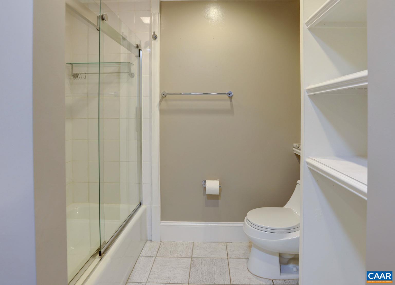 843 Campbell Road Keswick, VA 22947 - Photo 21 of 46 a bathroom with a toilet and a shower