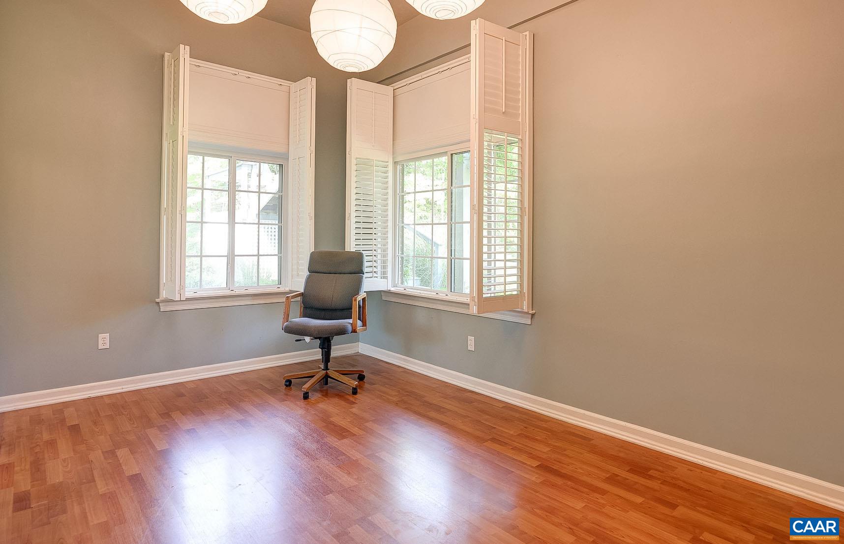 843 Campbell Road Keswick, VA 22947 - Photo 25 of 46 a view of a livingroom with wooden floor and a window