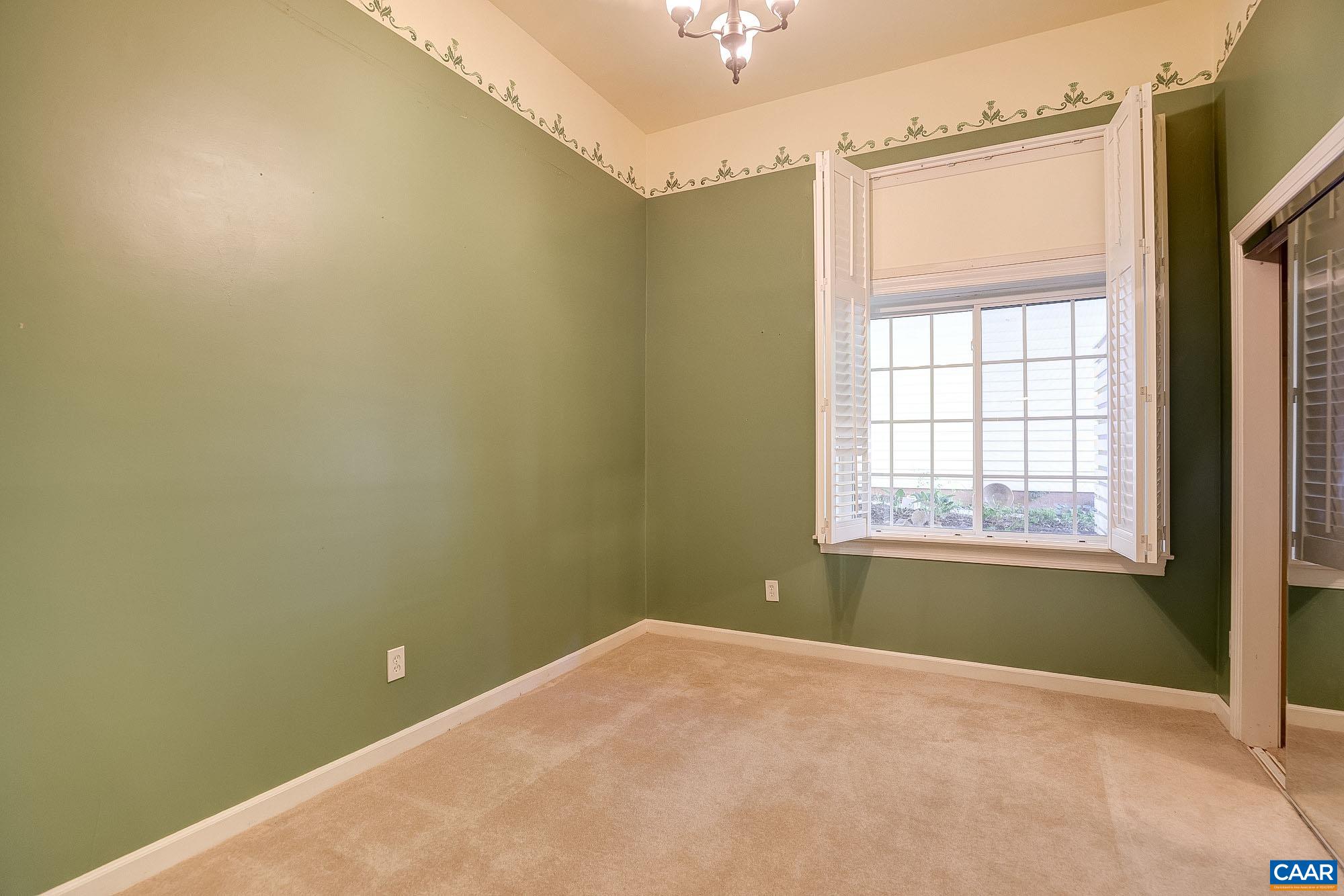 843 Campbell Road Keswick, VA 22947 - Photo 27 of 46 a view of an empty room with a window