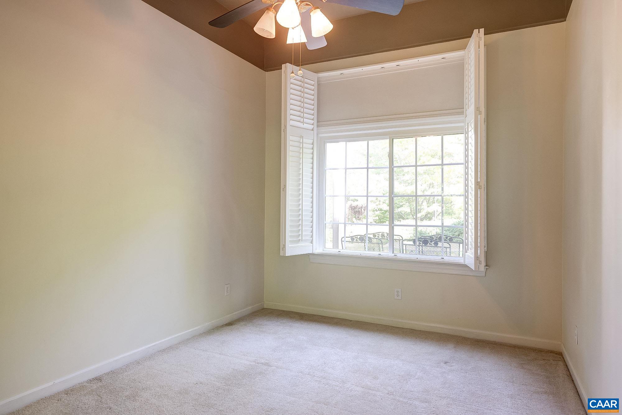 843 Campbell Road Keswick, VA 22947 - Photo 29 of 46 an empty room with a window