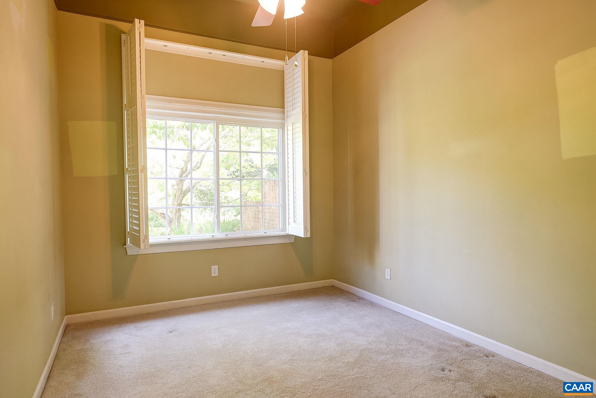 843 Campbell Road Keswick, VA 22947 - Photo 31 of 46 an empty room with a window