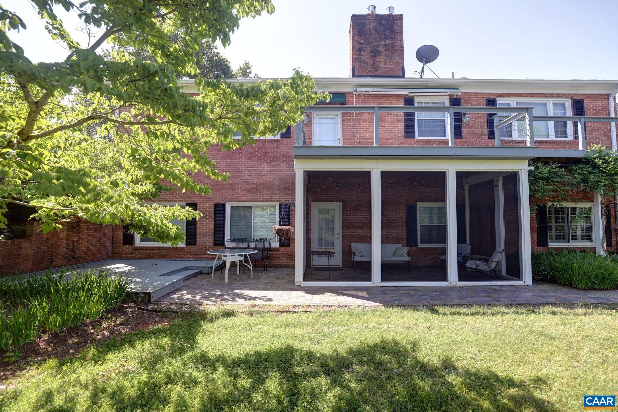 843 Campbell Road Keswick, VA 22947 - Photo 33 of 46 front view of a brick house with a yard