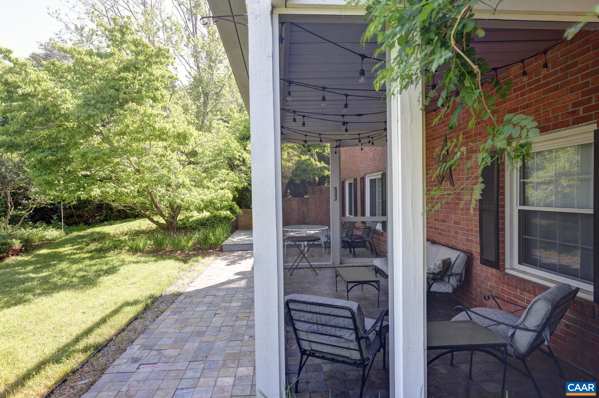 843 Campbell Road Keswick, VA 22947 - Photo 35 of 46 a view of balcony with two chairs and a table