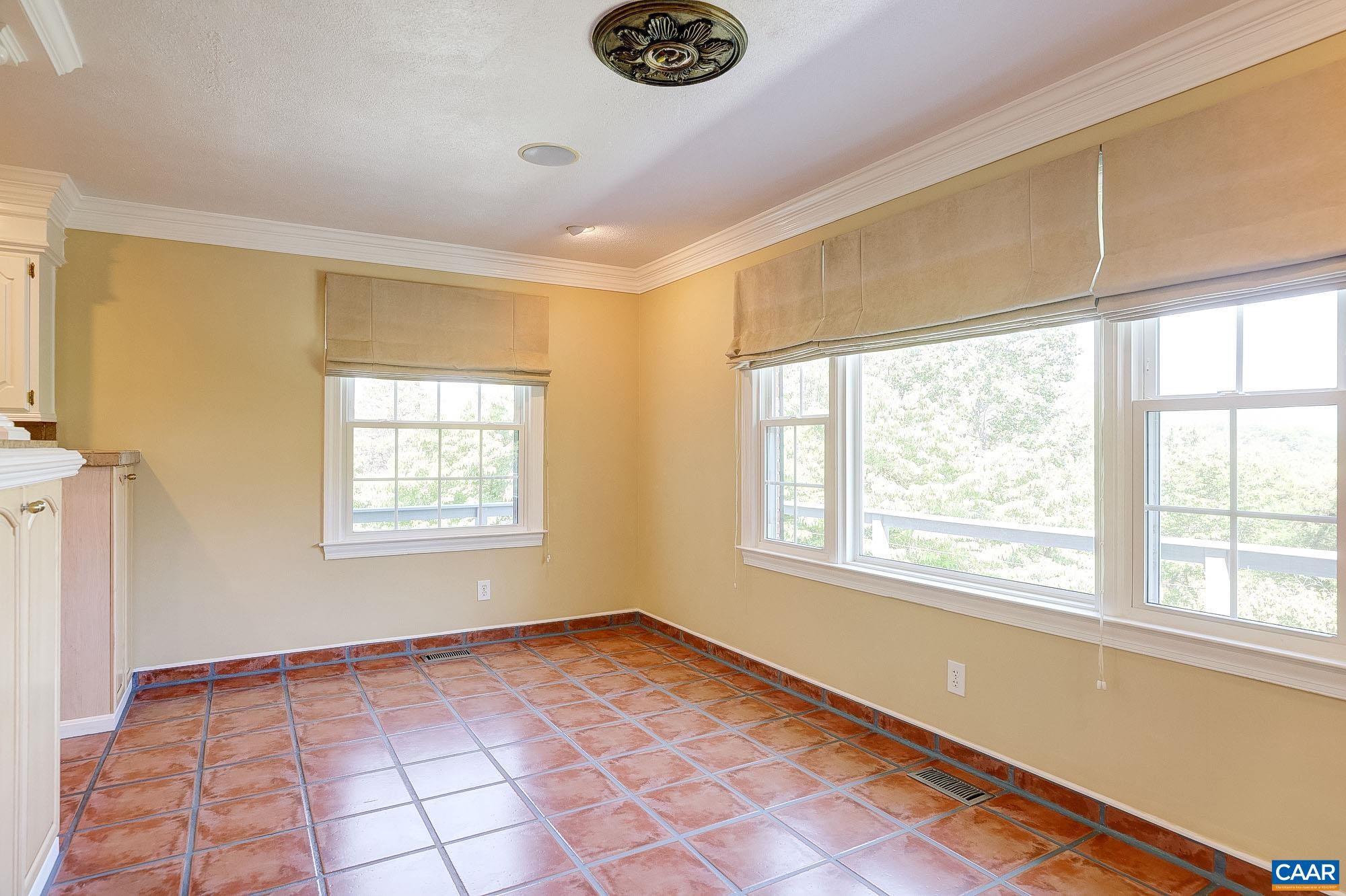 843 Campbell Road Keswick, VA 22947 - Photo 9 of 46 a view of an empty room with a window