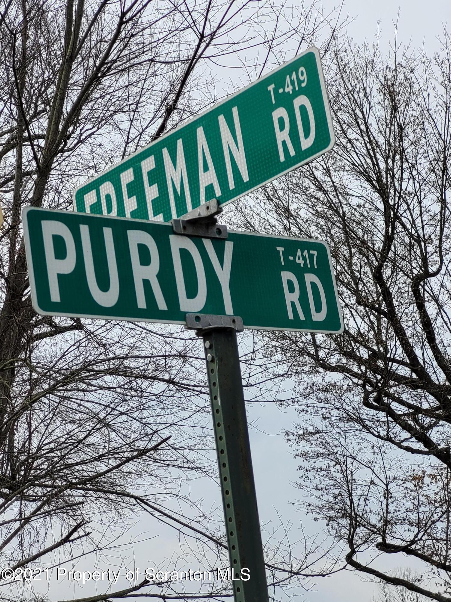 Freeman Road Dalton, PA 18414 - Photo 2 of 12 a sign that is on a brick wall