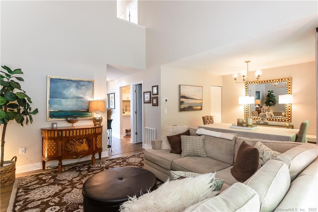 100 Hemlock Road, Unit 54 Branford, CT 06405 - Photo 1 of 1 Stunning living room and dining room.