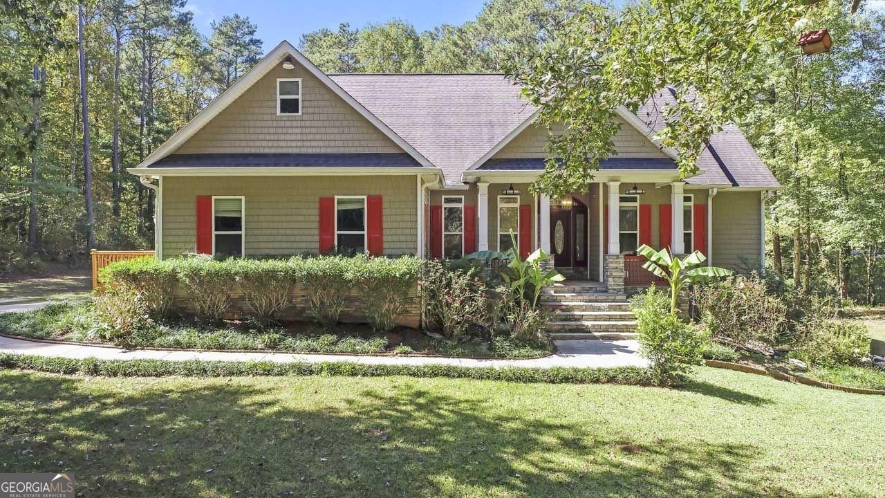 2051 East Atlanta Road Stockbridge, GA 30281 - Photo 1 of 1 a front view of a house with a yard
