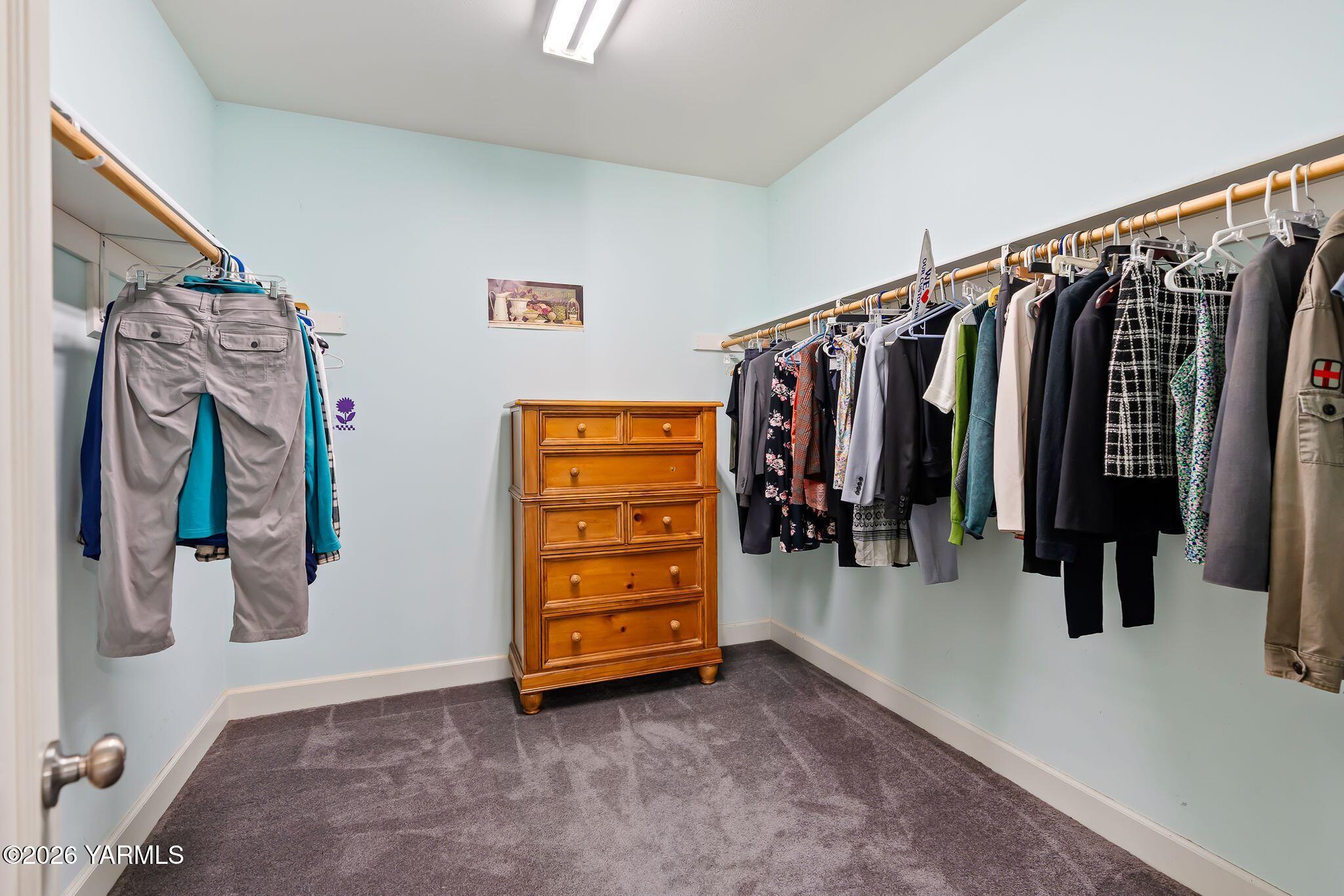 1575 Nile Road Naches, WA 98937 - Photo 21 of 51 a view of walk in closet with clothes and shoes