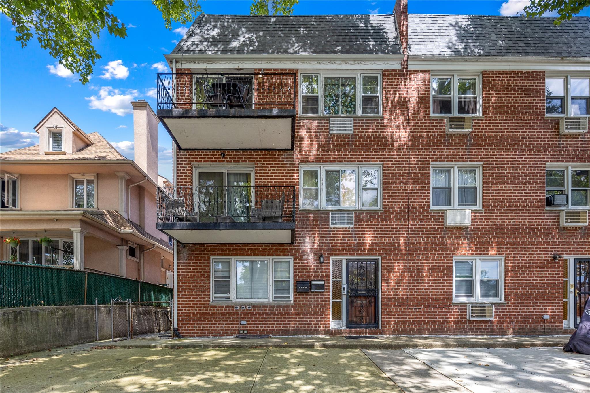 a view of a building with a swimming pool
