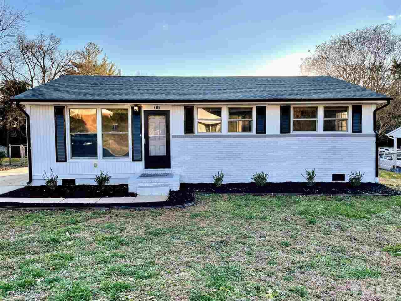 708 Hadley Road Raleigh, NC 27610 - Photo 1 of 20 a front view of a house with a yard