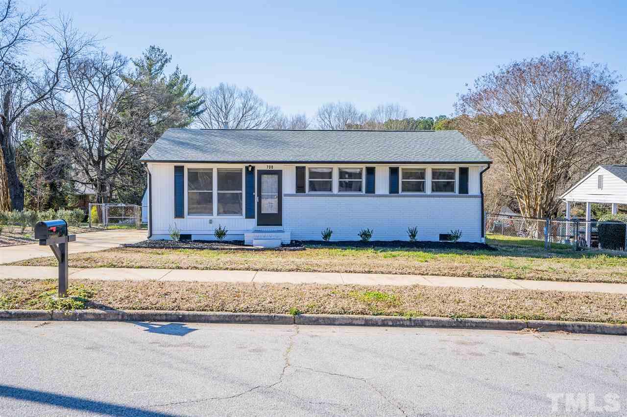 708 Hadley Road Raleigh, NC 27610 - Photo 2 of 20 a view of a house with a yard and large tree