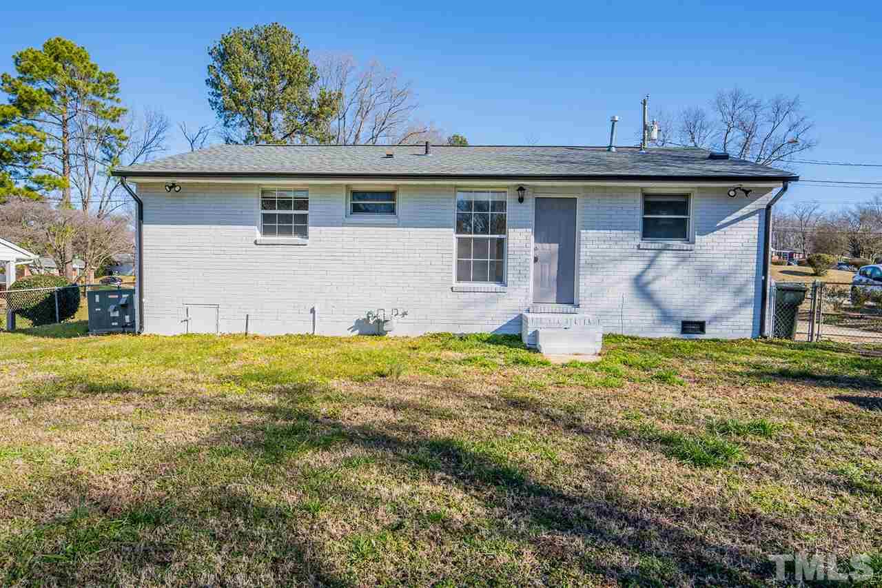 708 Hadley Road Raleigh, NC 27610 - Photo 18 of 20 a view of a house with backyard and garden