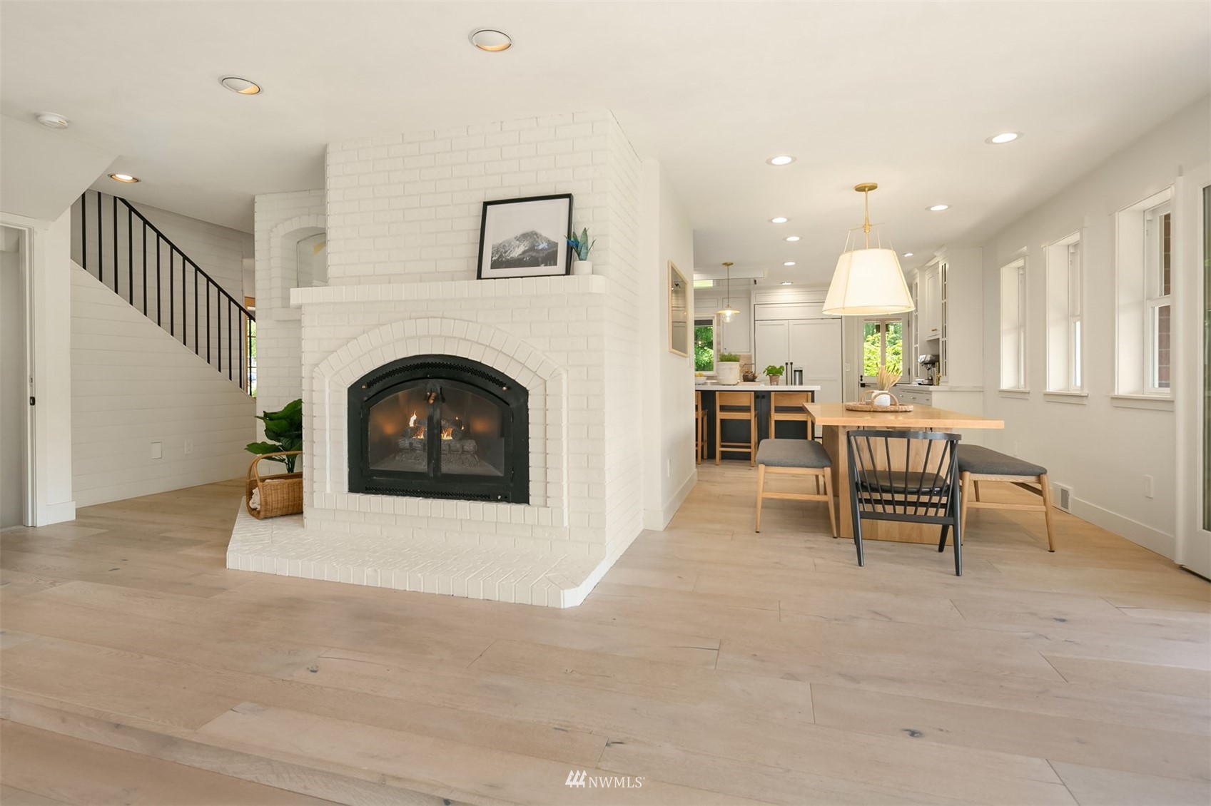 17227 Southeast May Valley Road Renton, WA 98059 - Photo 11 of 40 a living room with furniture and a fireplace