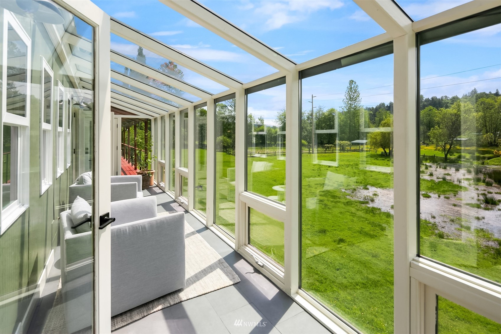 17227 Southeast May Valley Road Renton, WA 98059 - Photo 14 of 40 a living room with hardwood floor and furniture