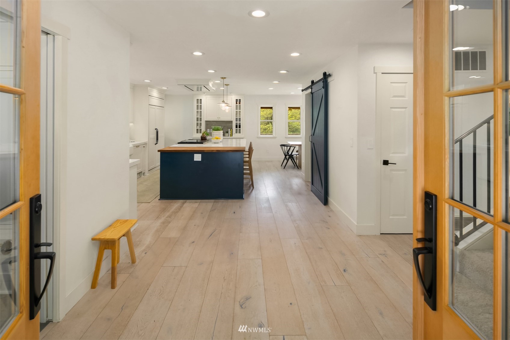 17227 Southeast May Valley Road Renton, WA 98059 - Photo 2 of 40 a large space with a lot of counter space and wooden floor