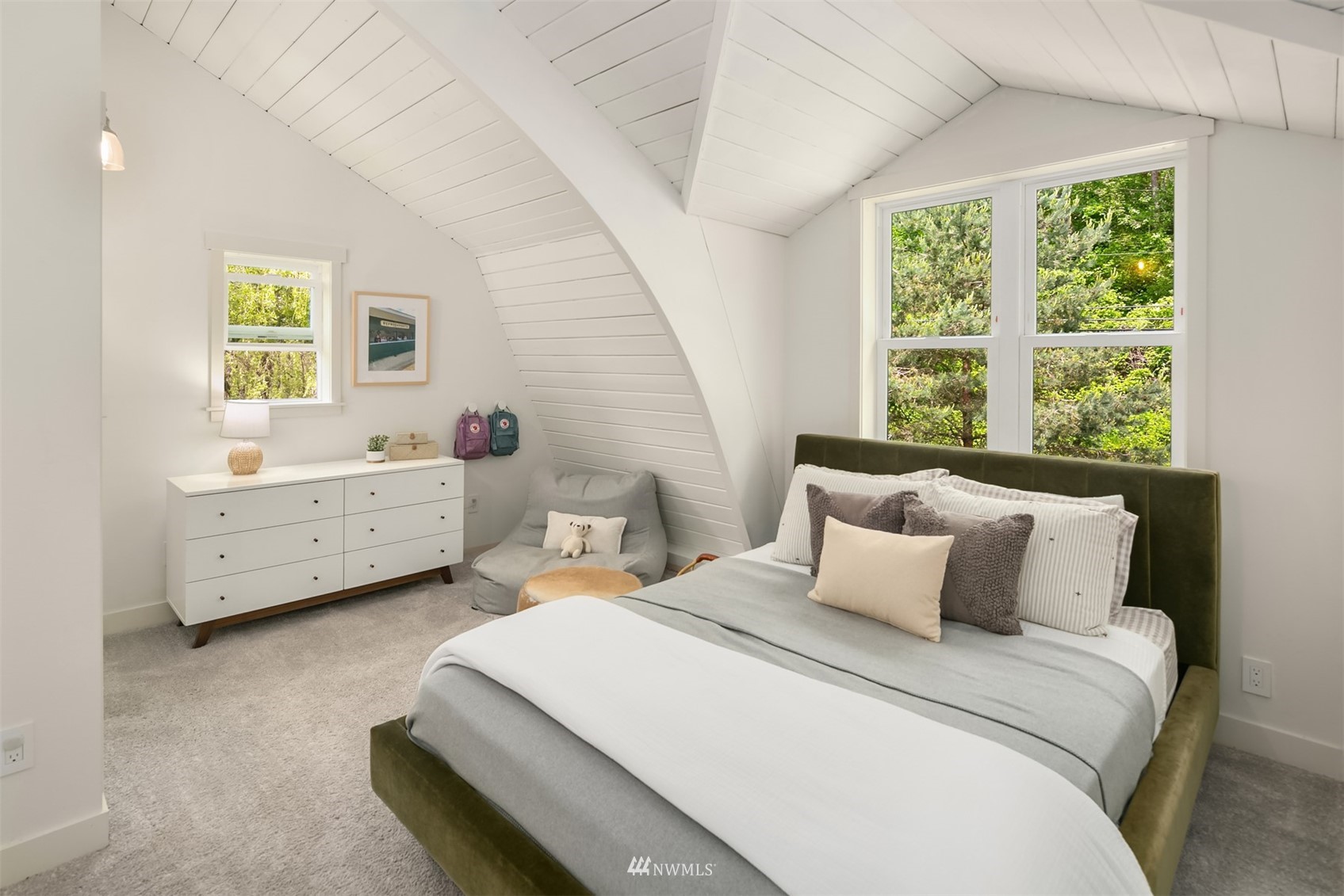 17227 Southeast May Valley Road Renton, WA 98059 - Photo 22 of 40 a bedroom with a bed and a window