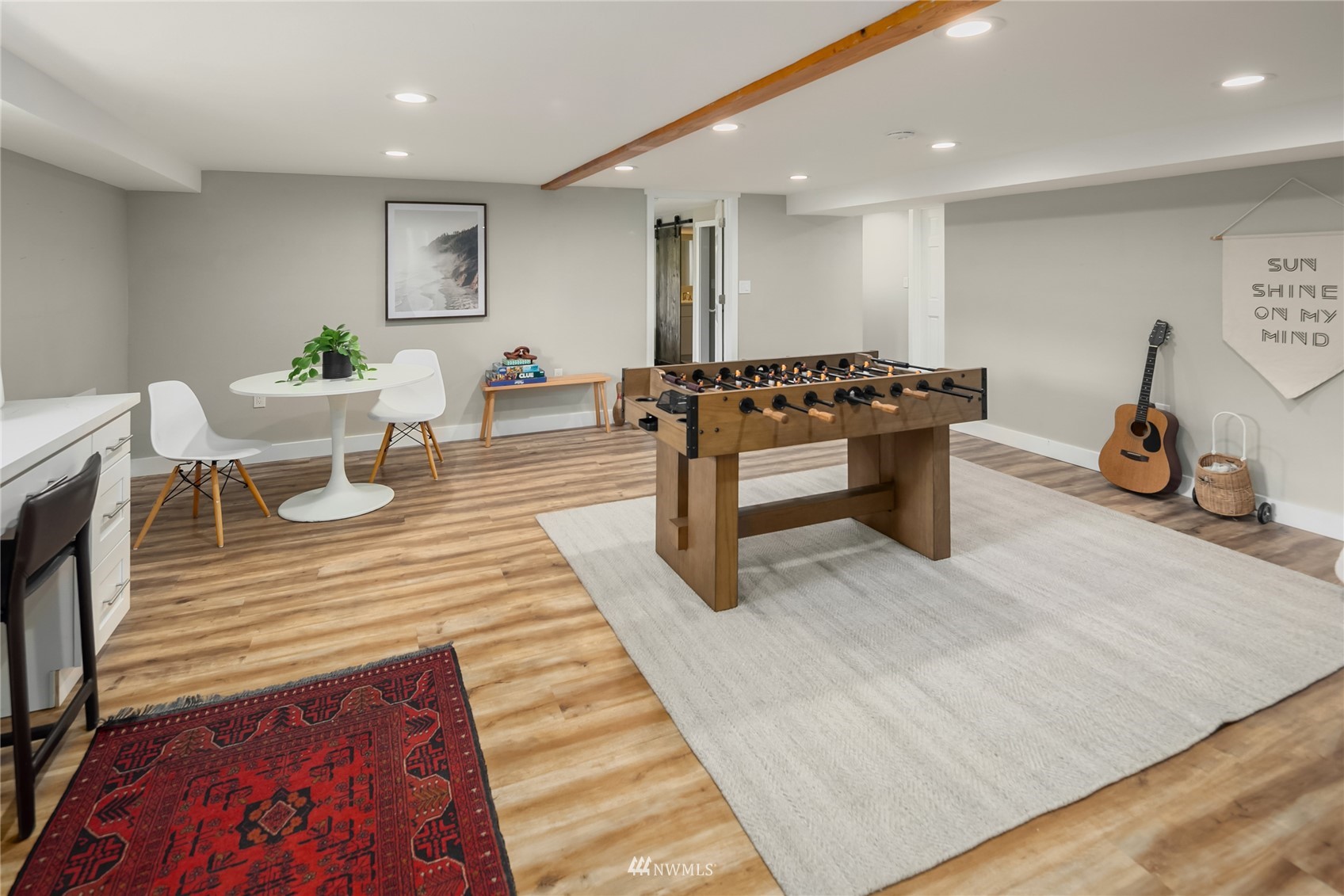 17227 Southeast May Valley Road Renton, WA 98059 - Photo 26 of 40 a living room with furniture a rug and a table
