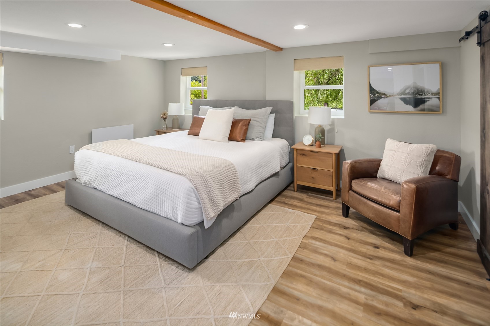 17227 Southeast May Valley Road Renton, WA 98059 - Photo 27 of 40 a bedroom with a bed and a couch