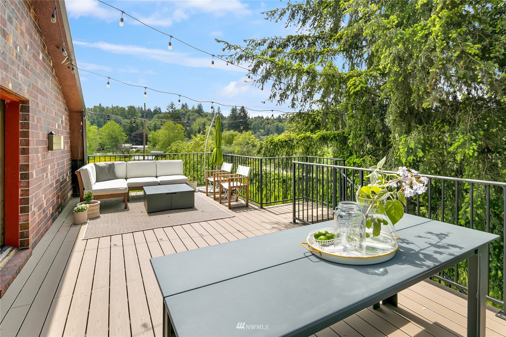 17227 Southeast May Valley Road Renton, WA 98059 - Photo 30 of 40 a view of balcony with furniture and potted plants
