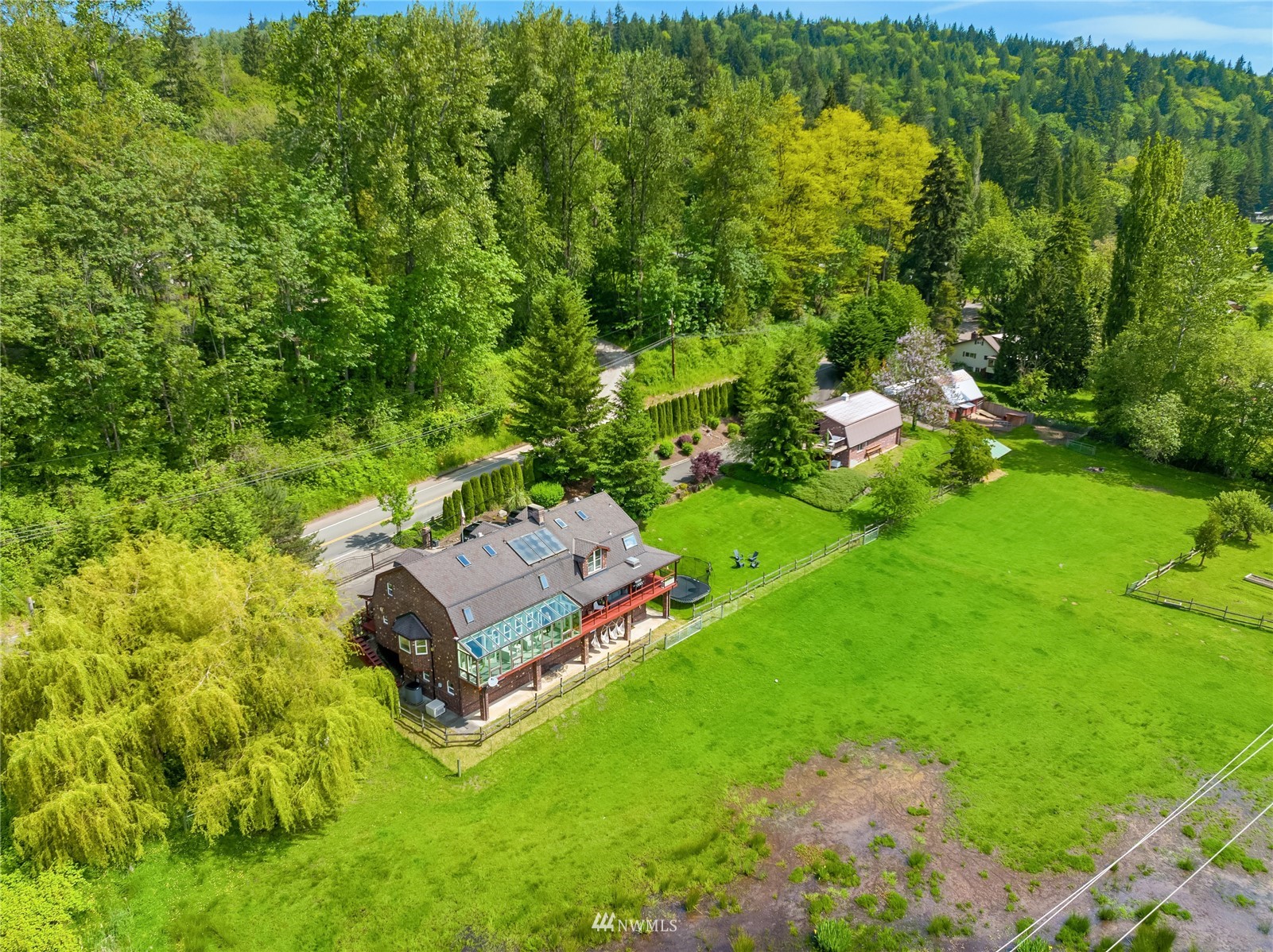 17227 Southeast May Valley Road Renton, WA 98059 - Photo 35 of 40 a view of a house with a yard