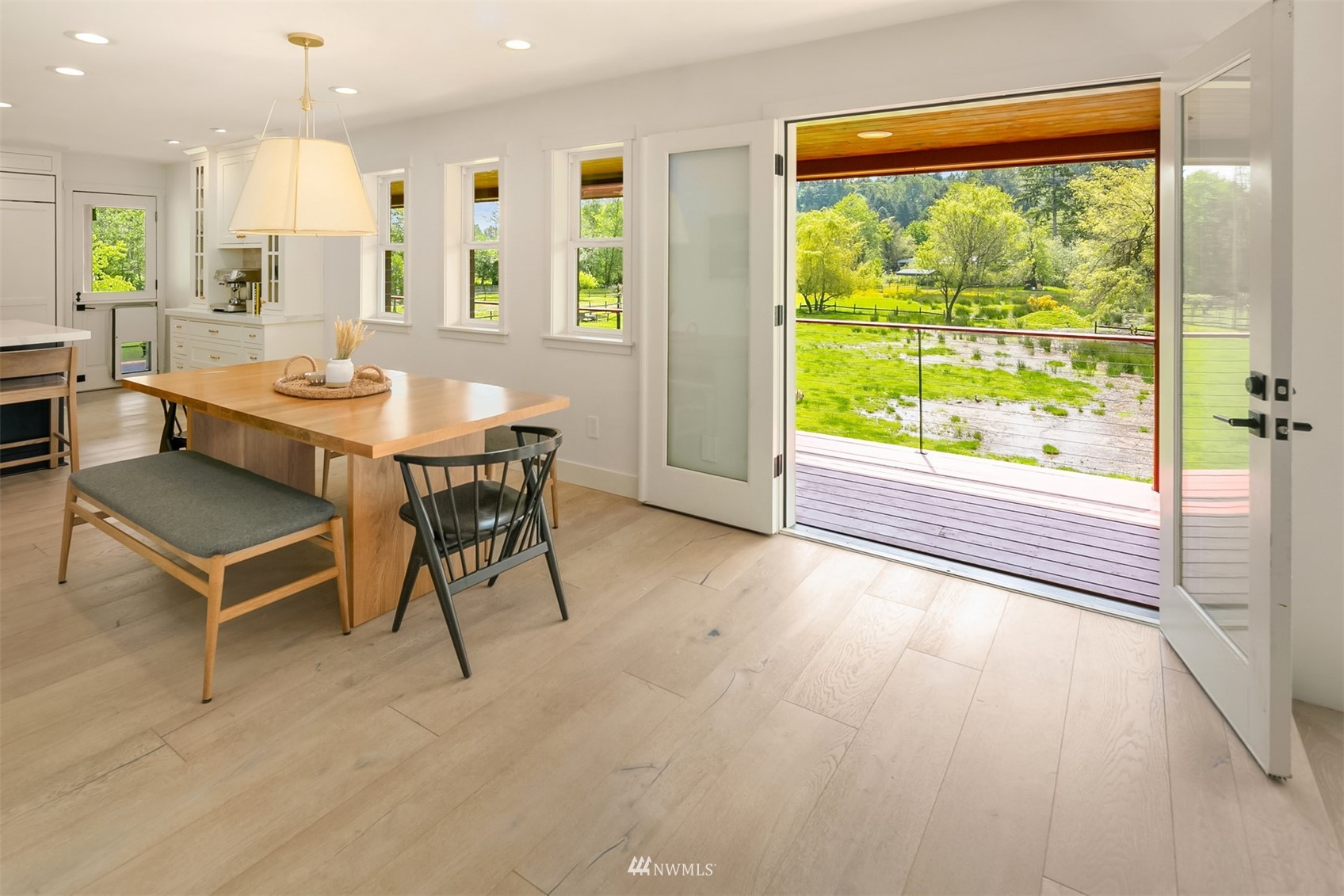17227 Southeast May Valley Road Renton, WA 98059 - Photo 7 of 40 a view of a dining room with furniture window and outside view