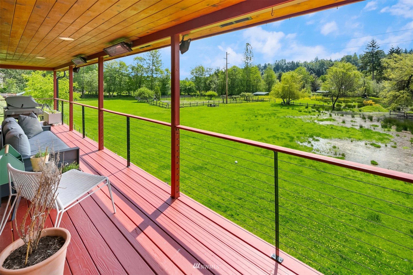 17227 Southeast May Valley Road Renton, WA 98059 - Photo 8 of 40 a view of deck with a table and chairs