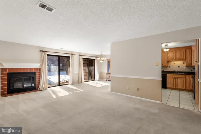 a view of a livingroom with a fireplace