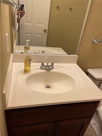 a bathroom with a bath tub with a shower