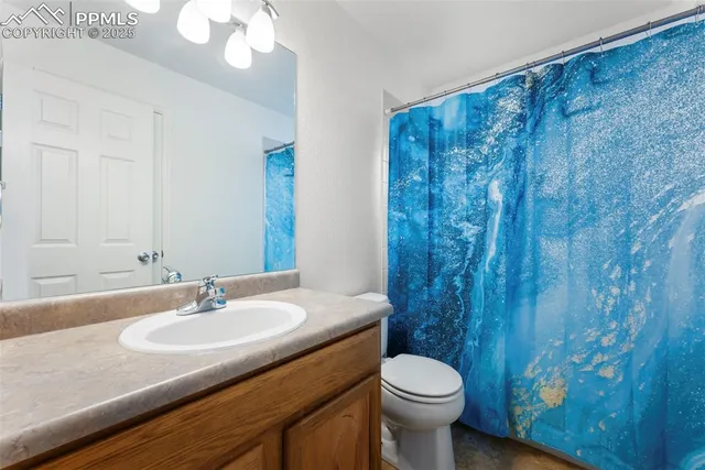 a bathroom with a sink and a toilet