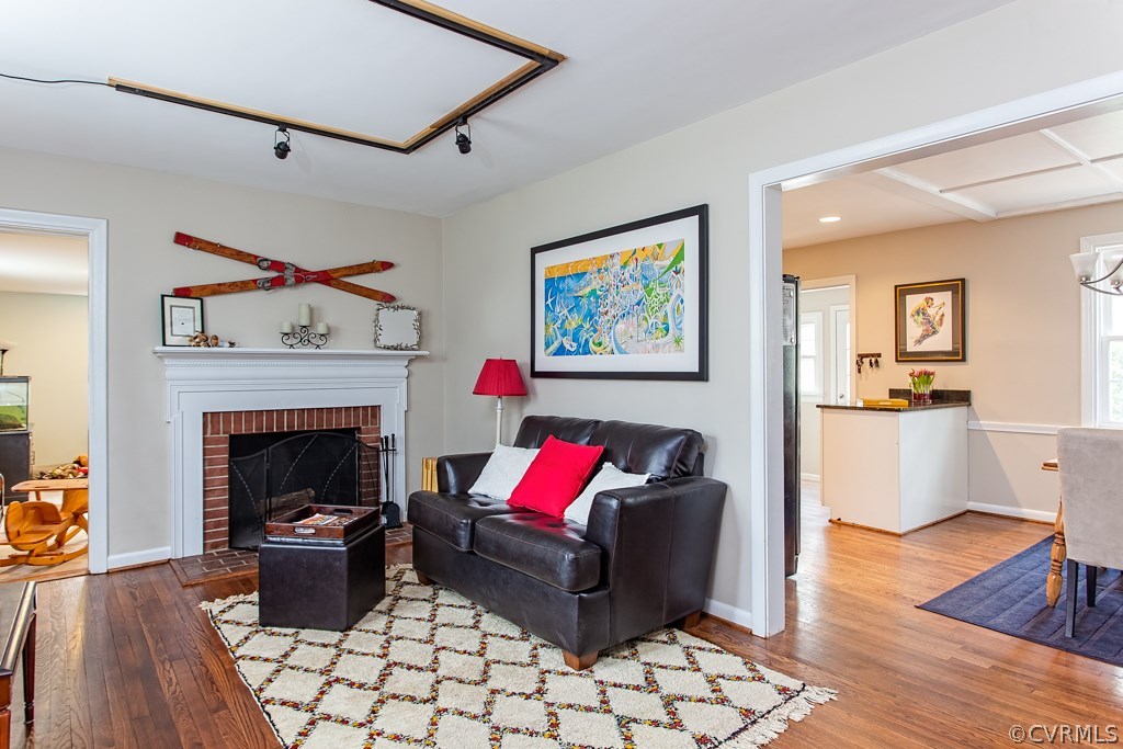 7802 Meherrin Road Richmond, VA 23229 - Photo 19 of 24 Open living room with wood burning fireplace