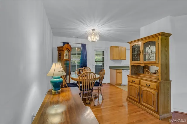 a kitchen with a refrigerator sink and stove