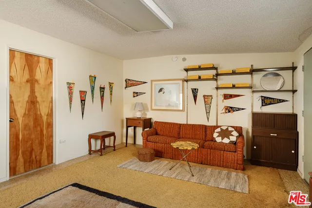 a room with furniture and a window