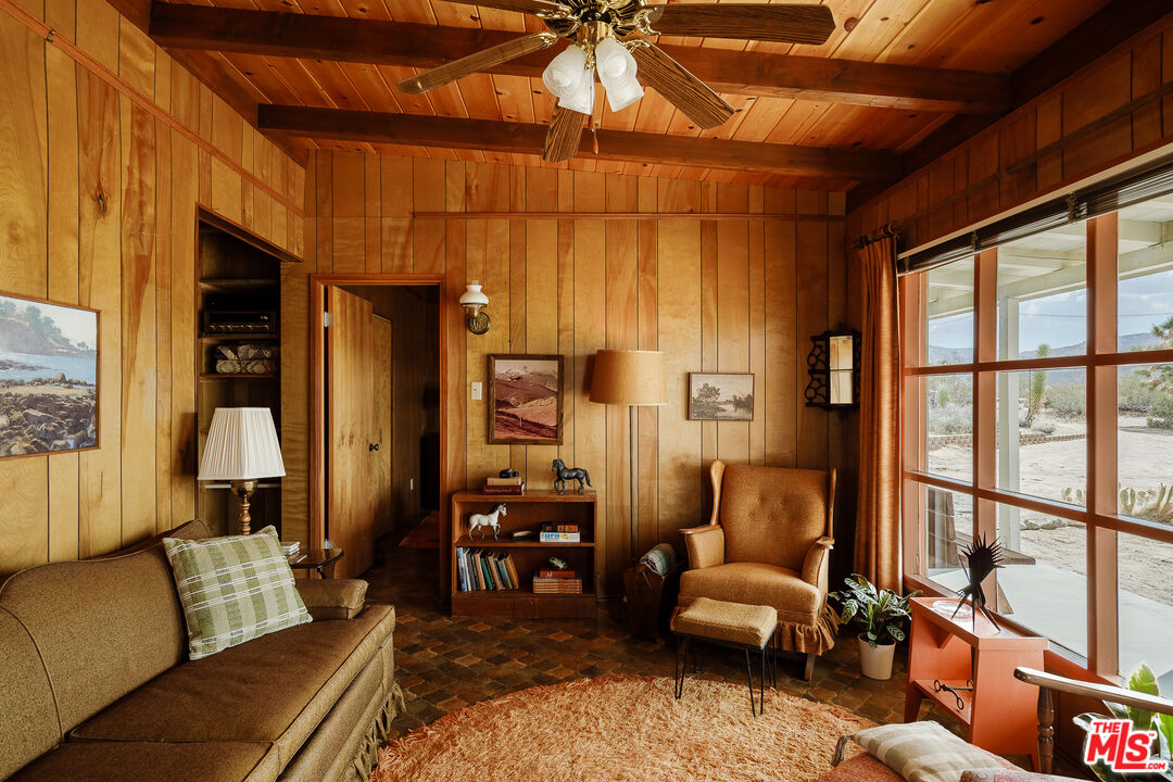 63670 Wagon Wheel Road Joshua Tree, CA 92252 - Photo 6 of 37 a living room with furniture and a window